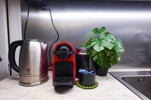 Whether you`re brewing morning coffee or cooking dinner, this kitchen offers all the space and tools for a culinary adventure.