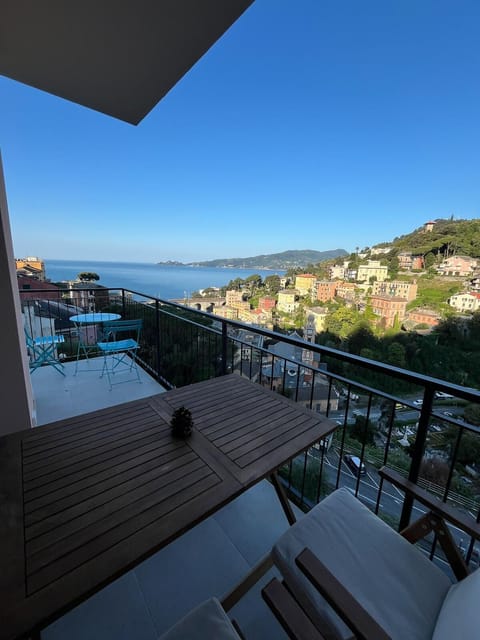 outdoor dining space and a glorious gaze at the sea