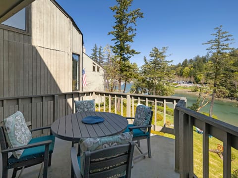 Back deck accessible by the sliding door off the living room.