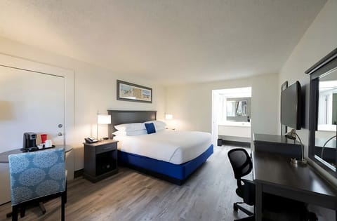 Unit with king bed. Exact unit will be assigned upon arrival. Views, colors, and decor may vary.