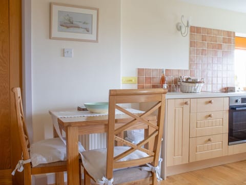 Furniture, Flooring, Interior Design, Wood, Floor, Cabinetry, Room, Chair, Kitchen & Dining Room Table, Lighting