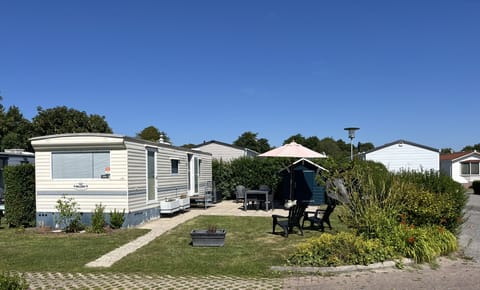 Front with garden of ZP 340 - Camping de Zandput