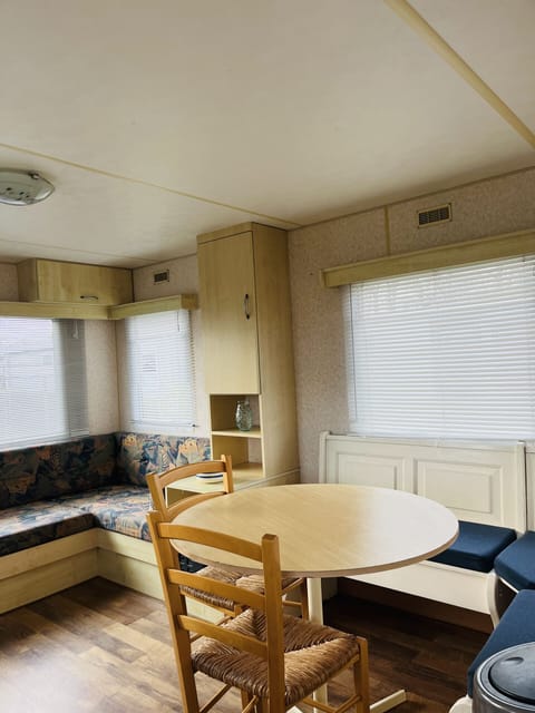 Sofa and dining table of ZP 340 – Camping de Zandput.