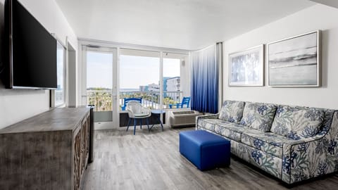 Living area. Exact unit will be assigned upon arrival. Views, colors, and decor may vary.