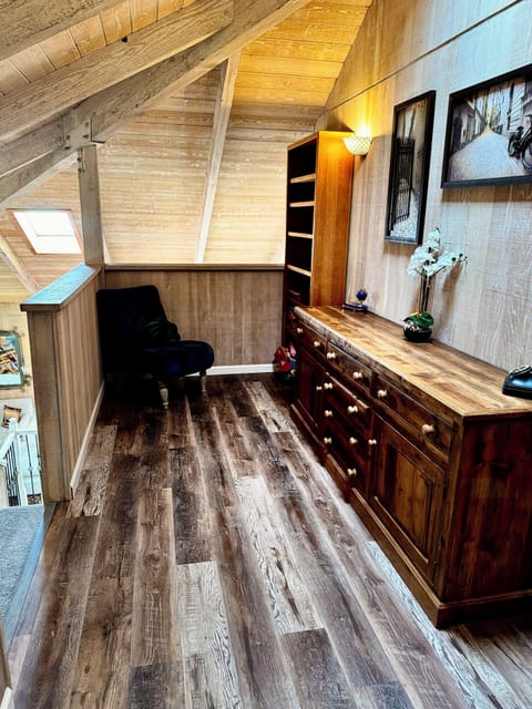 Upstairs nook with rustic charm—perfect for reading or quiet moments.
