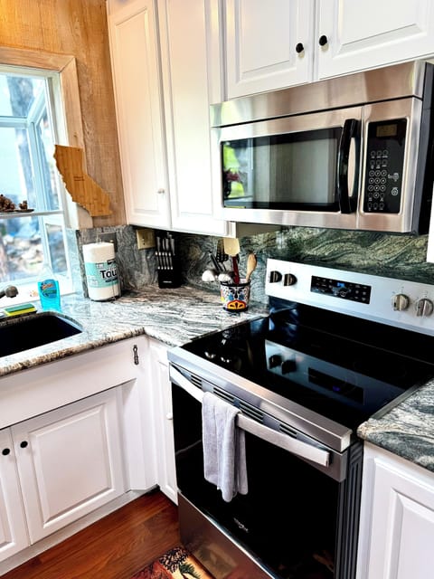 Modern appliances, granite-style counters, and everything you need to cook.