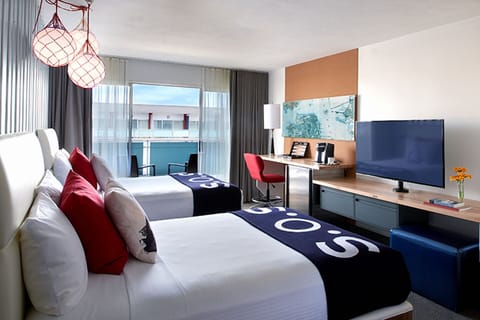 Step into a bright, playful room made for recharging.