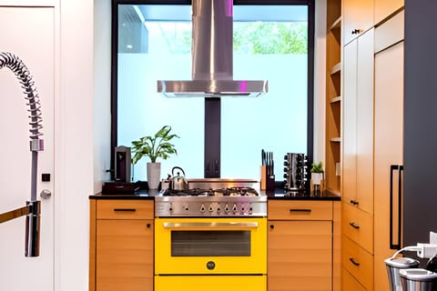 Completely Equipped Kitchen With Modern Appliances And Storage