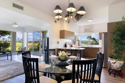Dine in style with an open concept layout, garden views, and a fully equipped kitchen.