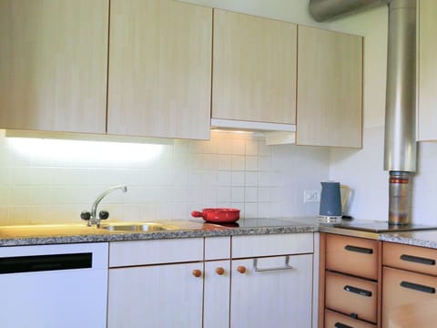 Kitchen, Countertop, Interior Design, Wood, Kitchen Appliance, Flooring, Cabinetry, Light Fixture, Lighting, Major Appliance