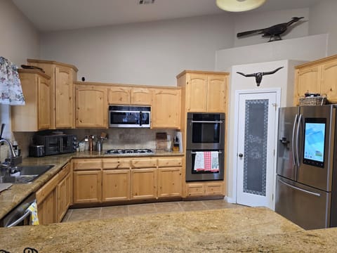 Full view of the kitchen from the bar.