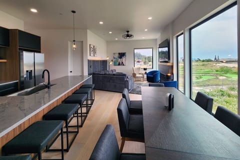 Large dining table and counter seating.