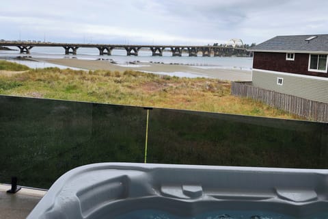 Sit and relax in the hot tub with bay and bridge views.