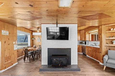 Open floor plan connecting living area, kitchen, and dining space for easy flow and great entertaining.