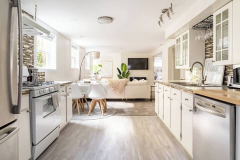 Fully stocked kitchen with full size fridge / freezer, dishwasher and gas range.