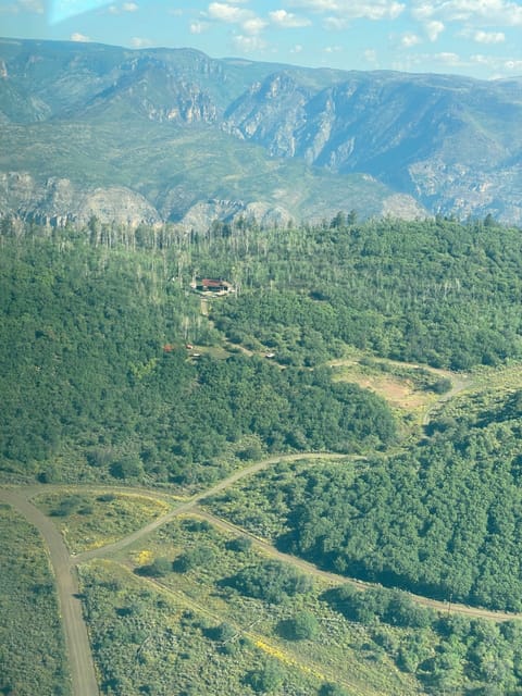 Aerial view of the mountain cabin
