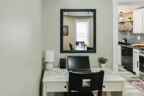 Workstation with WIFI. Located in dining room.