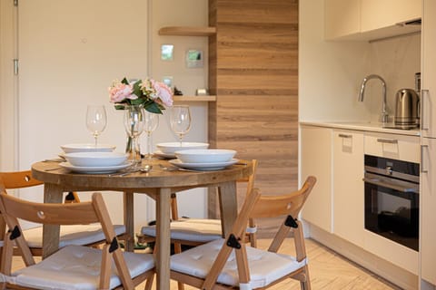 Stylish dining area for four – gather your loved ones around the table.