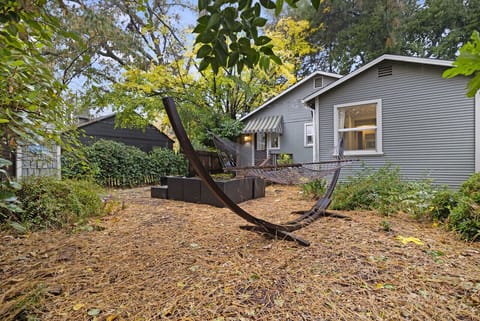 Large backyard with open space and natural surroundings