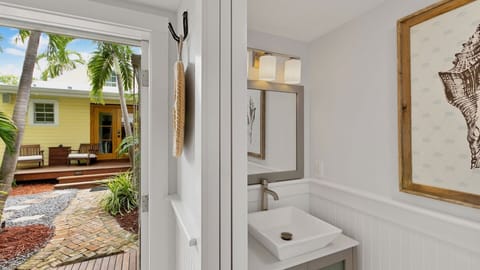 The Guest House has a half bath inside...