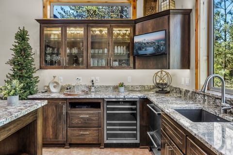 The bar area also comes equipped with a T.V..