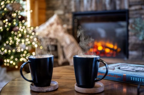 Savor your coffee by the Christmas tree