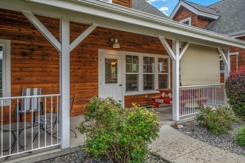 Outside patio with the sun shade pulled down one side