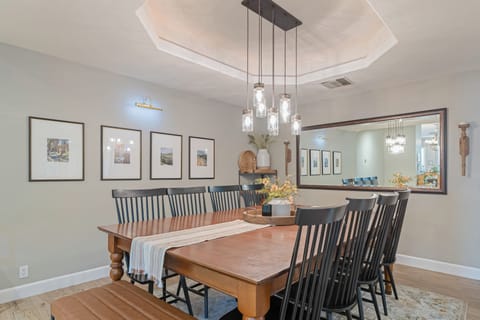 Dining area illuminated by charming lights.