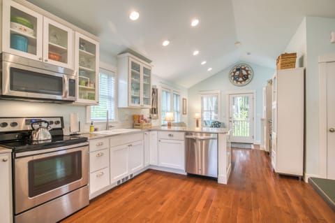 The kitchen is open concept with the dining room and kitchen. 