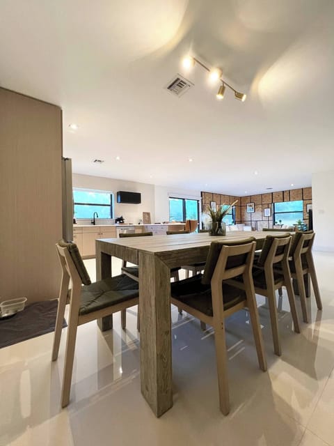 Kitchen and Dining Area: Open and Inviting: Dine and Entertain in This Spacious, Modern Kitchen