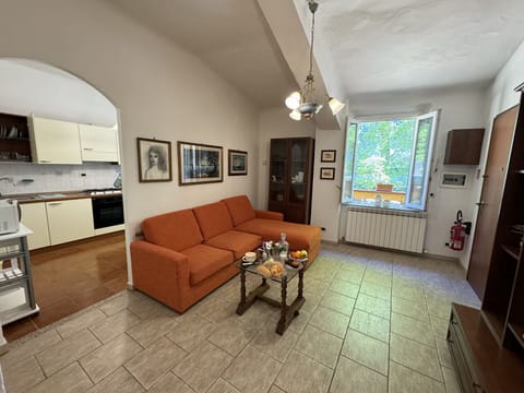 Furniture, Interior Design, Couch, Flooring, Apartment, Room, Floor, Ceiling, Living Room, Lighting