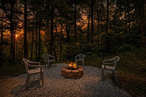 This fire pit is a forest hideaway all its own—circle up with loved ones, toast marshmallows, and let the crackle of the flames and the rustle of the leaves melt the stress away.