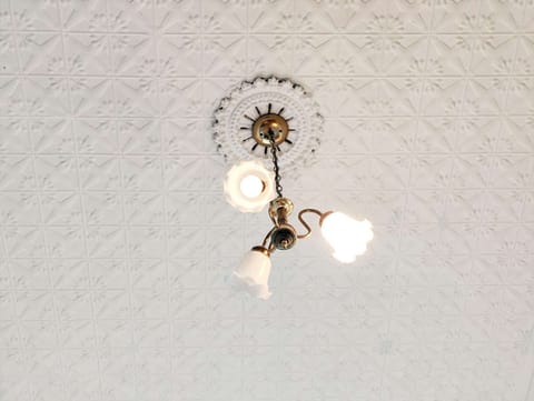 11ft moulded tin ceiling in bedroom 3