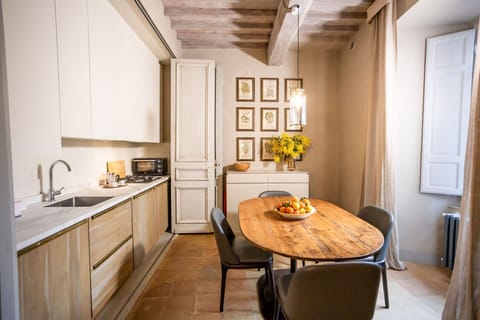 Furniture, Interior Design, Flooring, Wood, Floor, Home, Room, Table, Lighting, Countertop