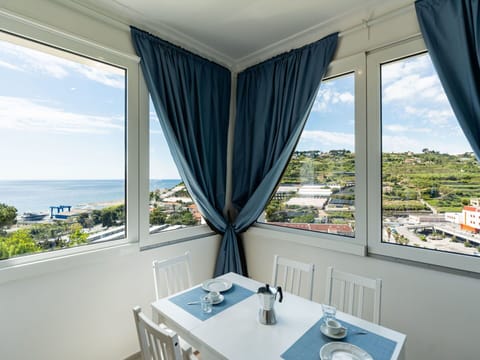 Furniture, Chair, Table, Outdoor Furniture, Outdoor Table, Porch, Kitchen & Dining Room Table, Balcony, Deck, Shade