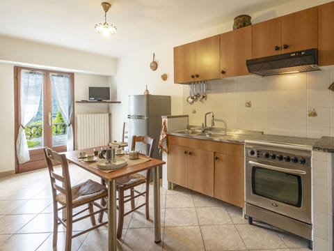 Furniture, Chair, Table, Outdoor Furniture, Outdoor Table, Porch, Kitchen & Dining Room Table, Balcony, Deck, Shade