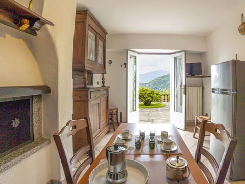 Furniture, Chair, Table, Outdoor Furniture, Outdoor Table, Porch, Kitchen & Dining Room Table, Balcony, Deck, Shade