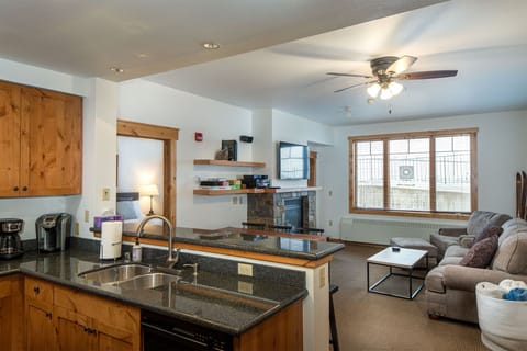 The open concept kitchen, living room & dining area provide a great gathering space for your whole group | Main Level