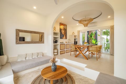 Enclosed air-conditioned living room with smart TV – Villa Merlin Bali