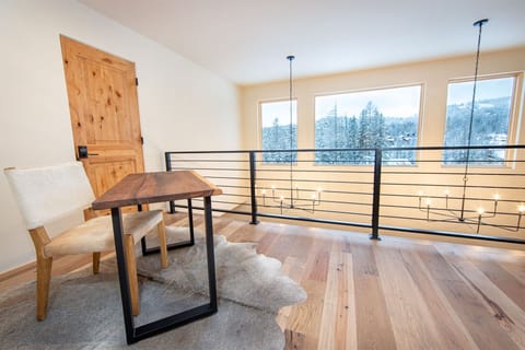 The loft adjacent to the master suite offers incredible views of the slopes | Upper Level