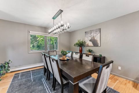 Elegant dining room with views of the yard