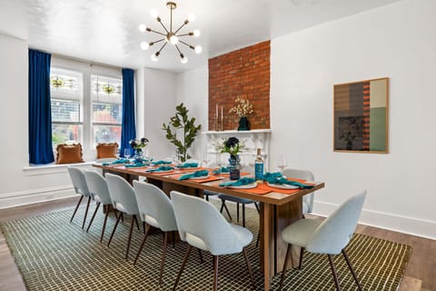 Dining area has windows with room darkening shades