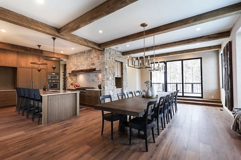 The open concept kitchen and dining area are a dream space for hosting a memorable meal | Main Level