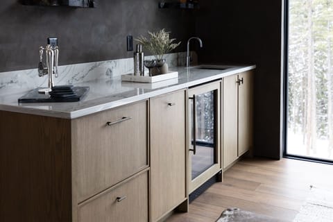 The main floor wine bar serves the living room and dining room | Main Level