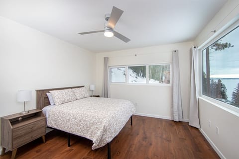 This bedroom offers a queen size bed | Main Floor