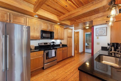Cook like a pro in this fully stocked kitchen, featuring high-end appliances, ample cabinetry, and plenty of space to create your culinary masterpieces.

