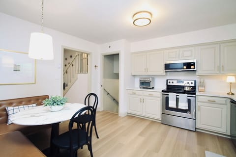 This newly renovated kitchen combines modern design with everyday functionality. Featuring updated finishes and contemporary style, the space is as beautiful as it is practical.

It comes fully stocked with all necessary cutlery, utensils, cookware, and kitchen essentials, so you can prepare everything from a quick breakfast to a full family dinner with ease. Whether you're a s...