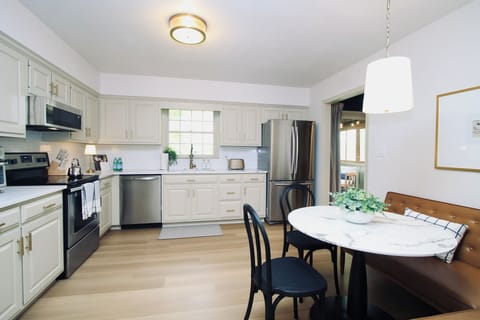 This fully equipped kitchen is designed to meet all your cooking and entertaining needs. Outfitted with sleek stainless steel appliances, it includes a full-size oven, microwave, dishwasher, and a refrigerator/freezer combination to keep everything fresh and organized.

For added convenience, a versatile air fryer/toaster oven combo is available—perfect for quick snacks or easy...