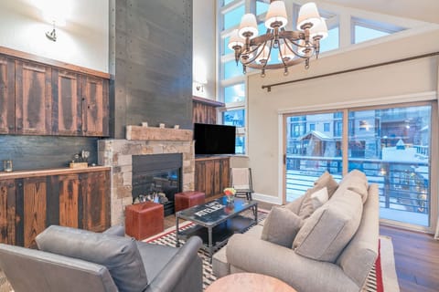 Remodeled and updated living room with vaulted ceilings
