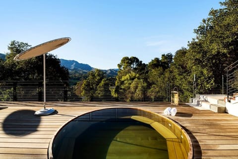 Relax in a serene wood-accented space with breathtaking mountain views and a luxurious spa.